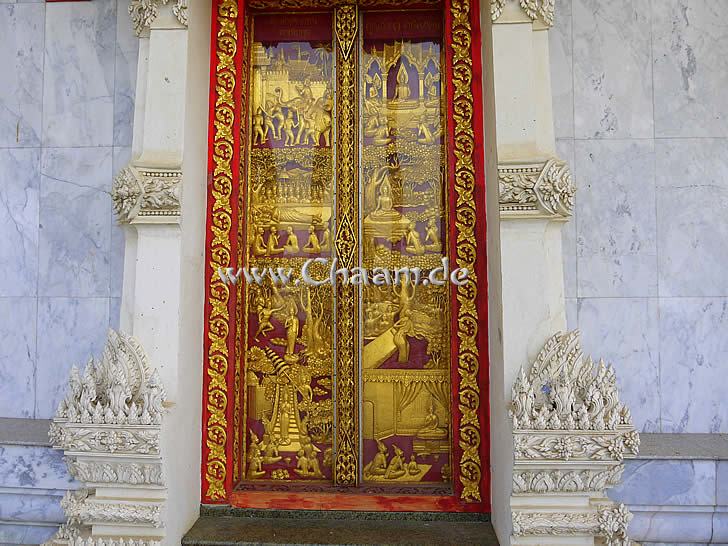 Golden gates in the Thai temple in Cha-Am