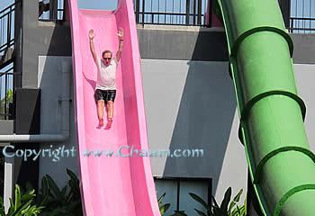 The hidden child in the man - water slides in Thailand