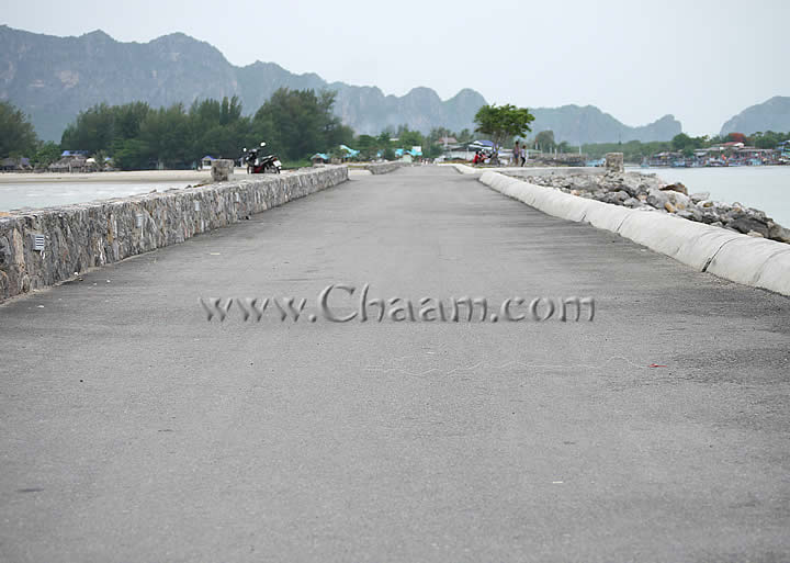 Romantic walk at promenade of Fishing Village Cha-Am